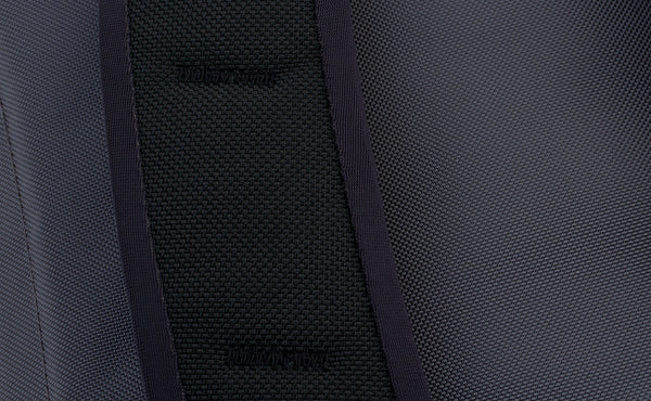A close shot of the bartacking on the shoulder straps.